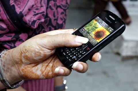 Indian woman with a phone