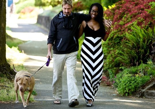 McAfee, 70 with wife, Janice Dyson, 30.