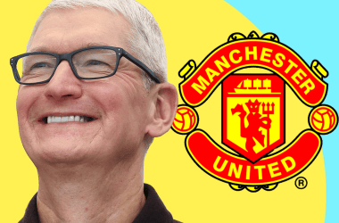 Apple CEO, Tim Cook is pictured smiling, wearing a black shirt and recommended black framed glasses against a yellow and teal background and the Manchester United football club logo behind his ear.