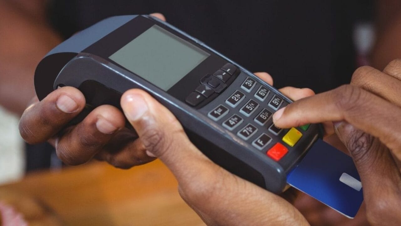 POS banking agents in Lagos adjusting withdrawal fees in response to new CBN policies limiting cash disbursement.